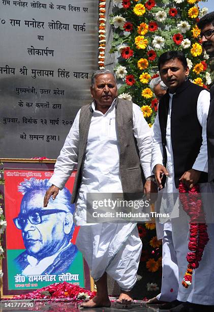 Uttar Pradesh Chief Minister Akhilesh Singh Yadav and Samajwadi Party Chief Mulayam Singh Yadav pay tribute to Ram Manohar Lohia on his 102nd birth...