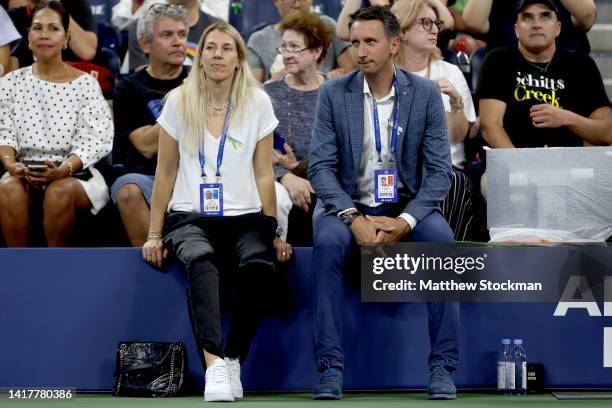 Former WTA player Olga Savchuk and former ATP player Sergiy Stakhovsky of Ukraine watch Rafael Nadal of Spain and Iga Swiatek of Poland play John...