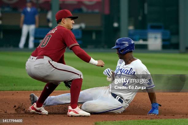 Michael A. Taylor of the Kansas City Royals steals second base against Josh Rojas of the Arizona Diamondbacks in the second inning at Kauffman...