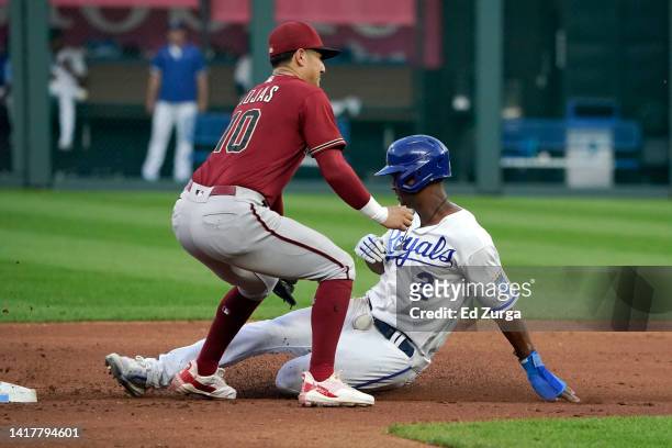 Michael A. Taylor of the Kansas City Royals steals second base against Josh Rojas of the Arizona Diamondbacks in the second inning at Kauffman...