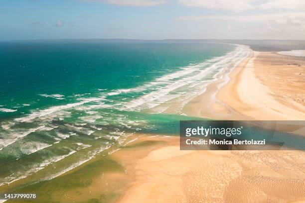 aerial view of sandy beach point estuary and ocean beach - combine oceania stock pictures, royalty-free photos & images