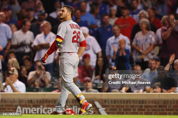 Nolan Arenado of the St. Louis Cardinals reacts after being thrown out of the game during the third inning for arguing a strikeout against the...