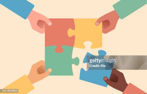 putting a puzzle together - teamwork stock illustrations