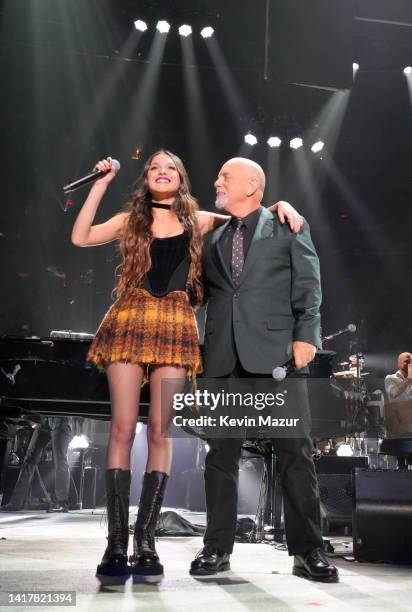 Olivia Rodrigo and Billy Joel perform "Deja Vu" and "Uptown Girl" onstage at Madison Square Garden on August 24, 2022 in New York City.