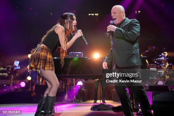 Olivia Rodrigo and Billy Joel perform "Deja Vu" and "Uptown Girl" onstage at Madison Square Garden on August 24, 2022 in New York City.