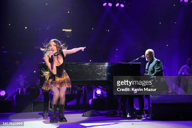 Olivia Rodrigo and Billy Joel perform "Deja Vu" and "Uptown Girl" onstage at Madison Square Garden on August 24, 2022 in New York City.