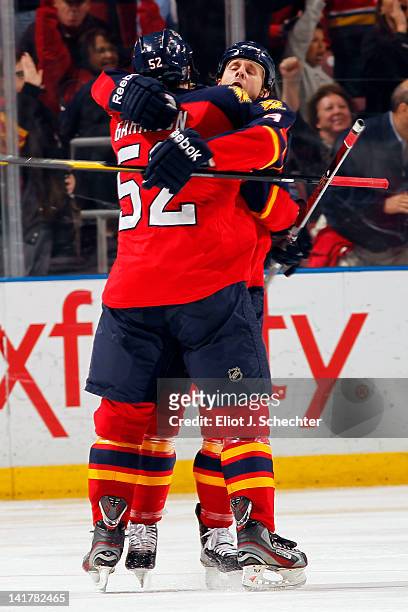 Jason Garrison of the Florida Panthers celebrates his goal with teammate Stephen Weiss at the BankAtlantic Center on March 23, 2012 in Sunrise,...