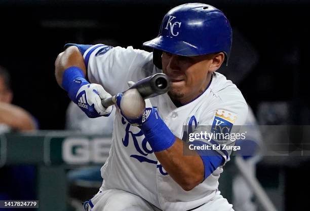 Nicky Lopez of the Kansas City Royals lays down a bunt to score Kyle Isbel on a fielder's choice in the seventh inning against the Arizona...