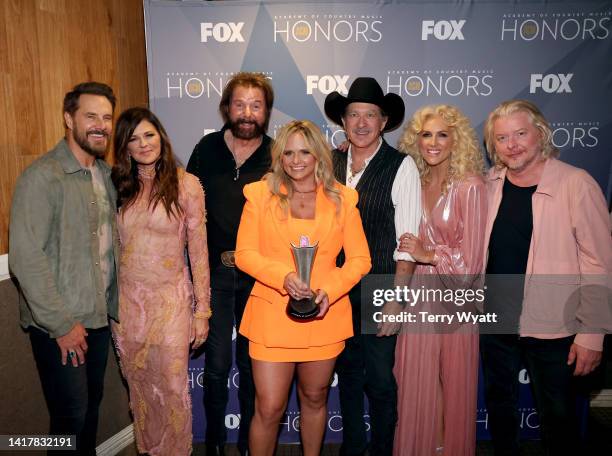 Jimi Westbrook, Karen Fairchild, Ronnie Dunn, Miranda Lambert, Kix Brooks, Kimberly Schlapman, and Phillip Sweet attend the 15th Annual Academy of...