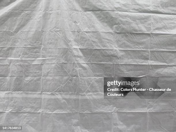 clean and empty white plastic surface in brussels, belgium - tarpaulin stock-fotos und bilder