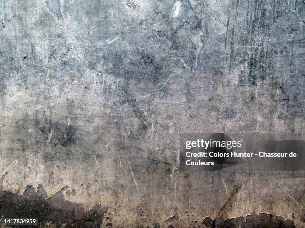 weathered and peeling gray paint on a metal plate in brussels, belgium - pátina fotografías e imágenes de stock