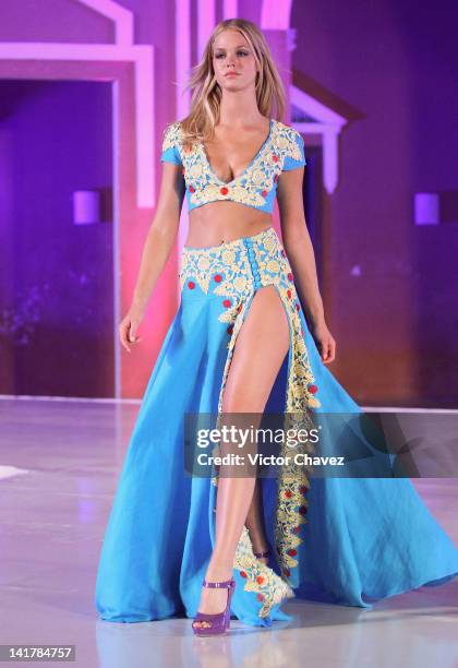 Model Erin Heatherton walks the runway wearing David Salomon "Cromatica Collection" during the Yucatan Moda Nextel 2012 fashion show at the Hacienda...