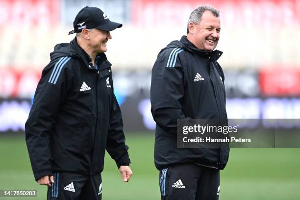 Assistant coach Joe Schmidt and head coach Ian Foster during a New Zealand All Blacks Training Session at Orangetheory Stadium on August 25, 2022 in...