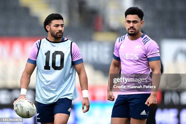 Stephen Perofeta and Richie Mo'unga of the All Blacks runthrough drills during a New Zealand All Blacks Training Session at Orangetheory Stadium on...