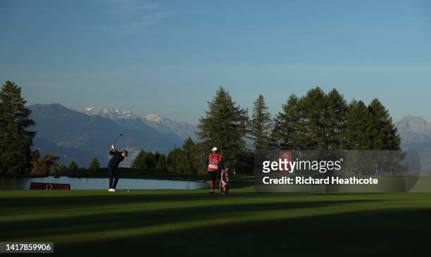 Filippo Celli of Italy plays his second shot on the 10th hole during Day One of the Omega European Masters at Crans-sur-Sierre Golf Club on August...