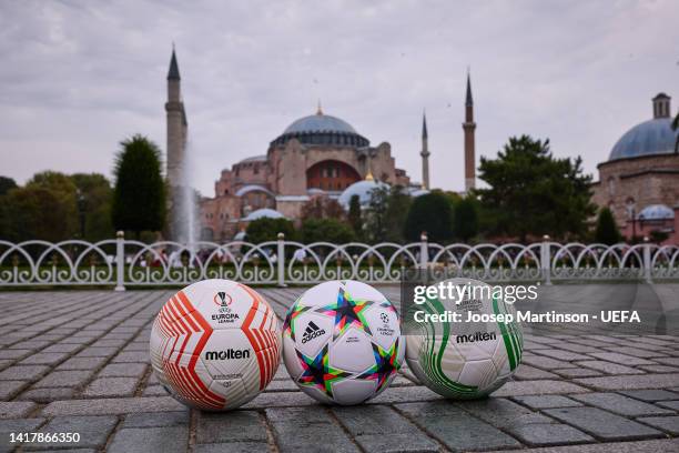 The official match ball of the UEFA Europa League, UEFA Champions League and UEFA Europa Conference League are pictured in front of Hagia Sophia...