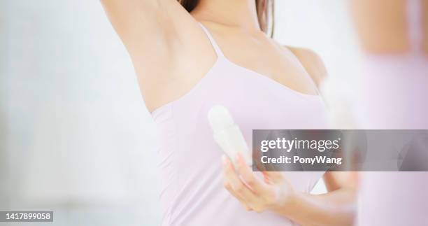 girl using antiperspirant - armpit hair stock pictures, royalty-free photos & images