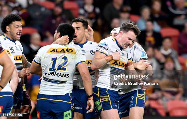 Clinton Gutherson of the Eels celebrates scoring a try during the round 24 NRL match between the Brisbane Broncos and the Parramatta Eels at Suncorp...