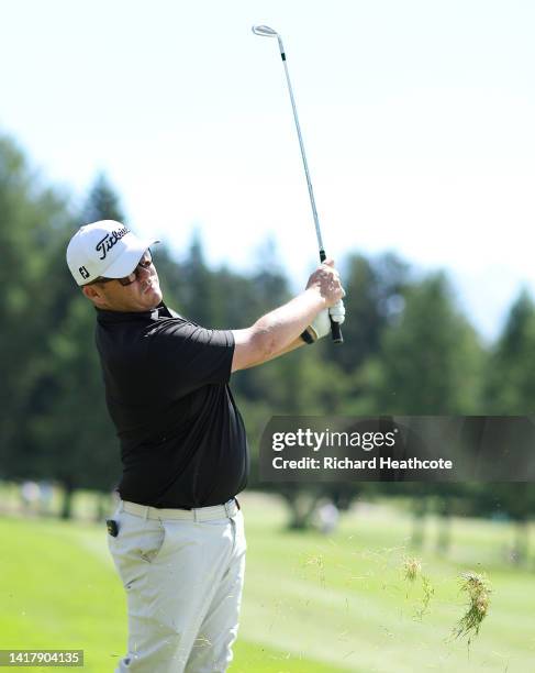 George Coetzee of South Africa plays his second shot on the 17th hole during Day One of the Omega European Masters at Crans-sur-Sierre Golf Club on...