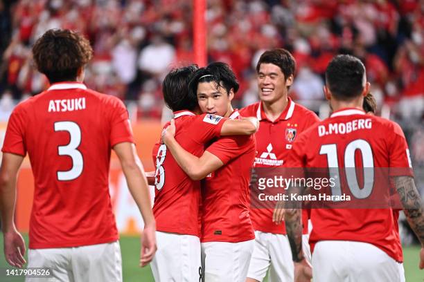 Yusuke Matsuo of Urawa Red Diamonds celebrates scoring his side's first goal with his teammates during the AFC Champions League semi final between...