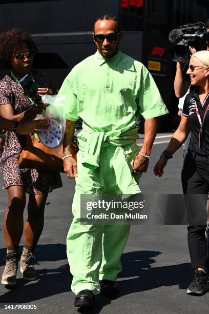 Lewis Hamilton of Great Britain and Mercedes walks in the Paddock during previews ahead of the F1 Grand Prix of Belgium at Circuit de...