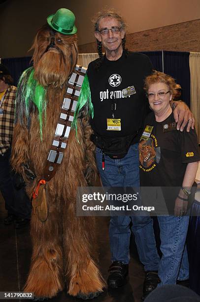 Actor Peter Mayhew and wife Angie Mayhew with Chewbacca participate in the 2012 WonderCon - Day 2 held at Anaheim Convention Center on March 17, 2012...