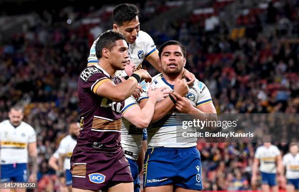 Isaiah Papali'i of the Eels celebrates scoring a try during the round 24 NRL match between the Brisbane Broncos and the Parramatta Eels at Suncorp...