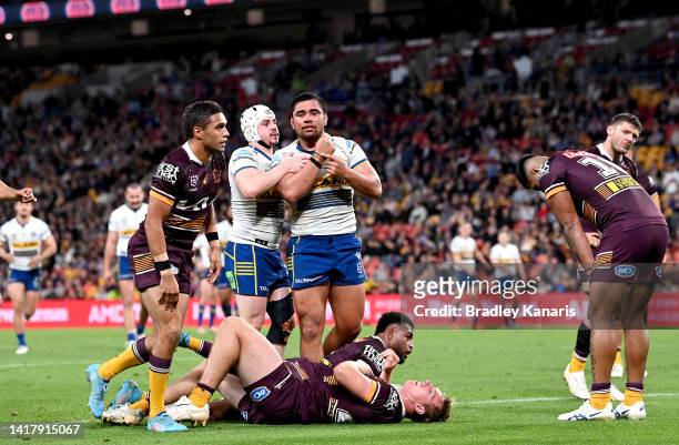 Isaiah Papali'i of the Eels celebrates scoring a try during the round 24 NRL match between the Brisbane Broncos and the Parramatta Eels at Suncorp...