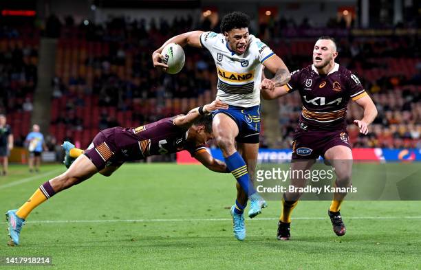 Waqa Blake of the Eels breaks through the defence during the round 24 NRL match between the Brisbane Broncos and the Parramatta Eels at Suncorp...