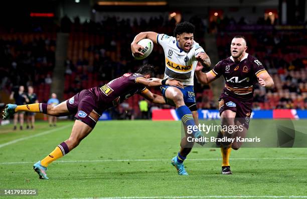 Waqa Blake of the Eels breaks through the defence during the round 24 NRL match between the Brisbane Broncos and the Parramatta Eels at Suncorp...