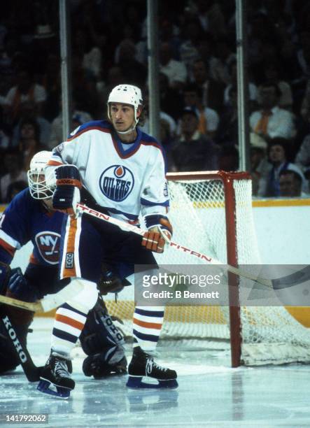 Wayne Gretzky of the Edmonton Oilers skates in front of goalie Billy Smith of the New York Islander during the 1983 Stanley Cup Finals in May, 1983...