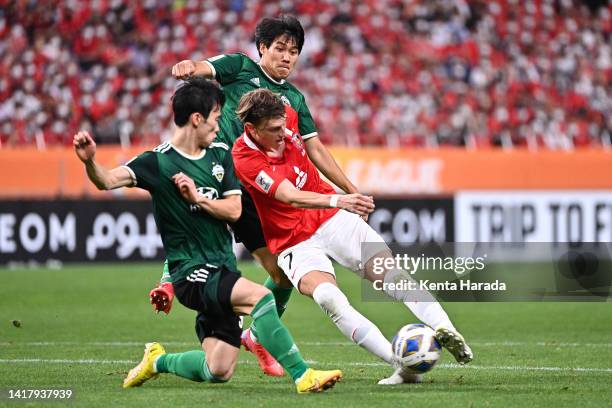 Kasper Junker of Urawa Red Diamonds shoots at goal while Jeonbuk Hyundai Motors defense attempt to block during the AFC Champions League semi final...