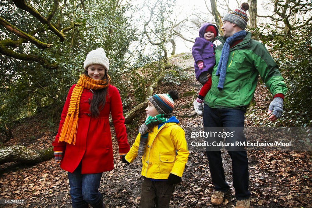 Family walking together in forest