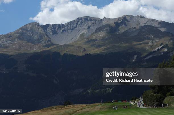 Players walk on the seventh hole during Day One of the Omega European Masters at Crans-sur-Sierre Golf Club on August 25, 2022 in Crans-Montana,...