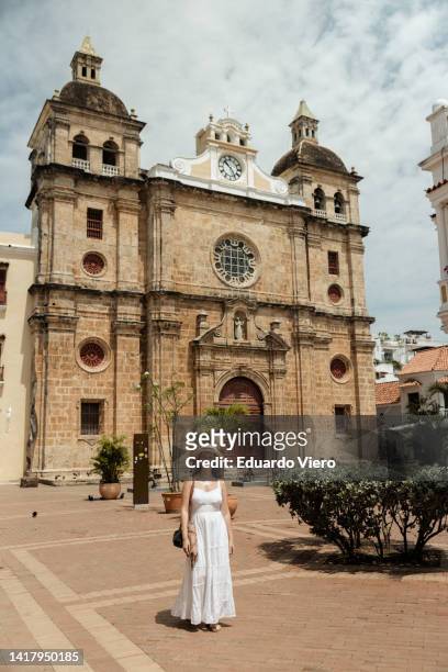 girl walking in a square - cartagena colombia stock pictures, royalty-free photos & images