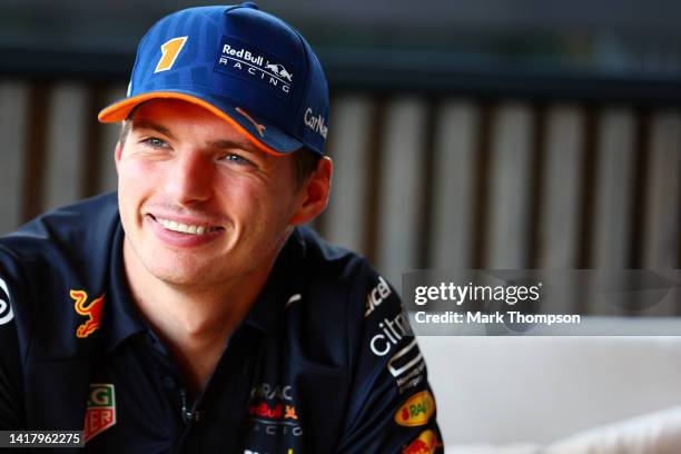 Max Verstappen of the Netherlands and Oracle Red Bull Racing looks on in the Paddock during previews ahead of the F1 Grand Prix of Belgium at Circuit...