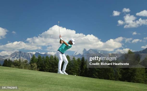Guido Migliozzi of Italy plays his second shot on the 12th hole during Day One of the Omega European Masters at Crans-sur-Sierre Golf Club on August...