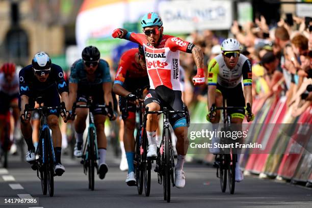 Caleb Ewan of Australia and Team Lotto Soudal celebrates at finish line as stage winner ahead of Jonathan Milan of Italy and Team Bahrain Victorious,...