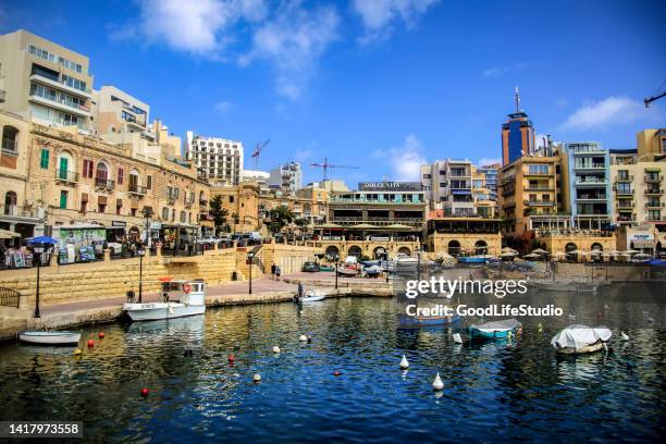 spinola bay at st. julian’s - malta business stock pictures, royalty-free photos & images