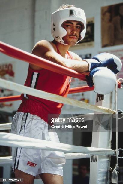Boxer Oscar De La Hoya of the United States poses for photograph during a training session on 1st June 1991 at the Resurrection Gym in Boyle Heights,...