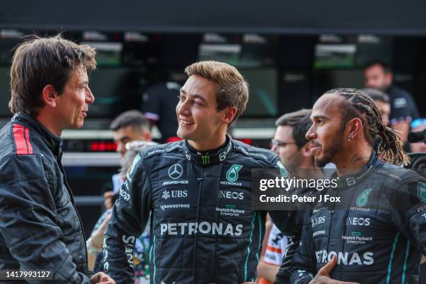 Toto Wolff and Austria and Mercedes with George Russell of Mercedes and Great Britain and Lewis Hamilton of Mercedes and Great Britain during...