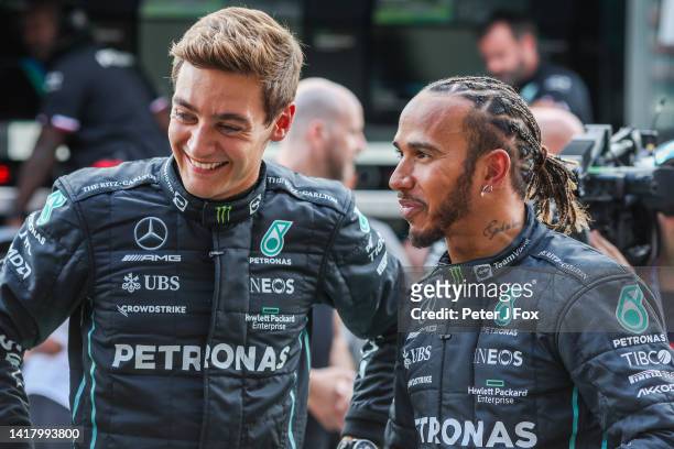 George Russell of Mercedes and Great Britain and Lewis Hamilton of Mercedes and Great Britain during previews ahead of the F1 Grand Prix of Belgium...