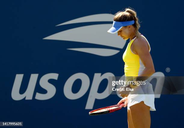 Eugenie Bouchard of Canada reacts before she serves to Linda Noskova of the Czech Republic during round three of the qualifying round of the US Open...