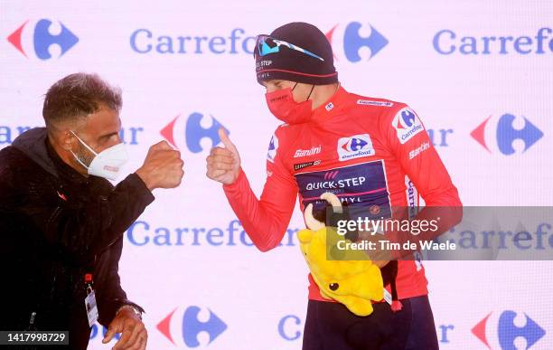 Oscar Pereiro of Spain Ex Pro-cyclist winner of the Tour of France 2006 and Remco Evenepoel of Belgium and Team Quick-Step - Alpha Vinyl celebrate...