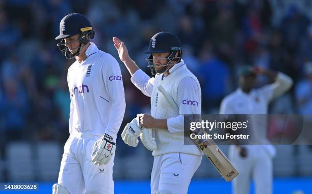 England batsmen Zak Crawley is congratulated by Jonny Bairstow as the pair leave the field not out after day one of the second test match between...