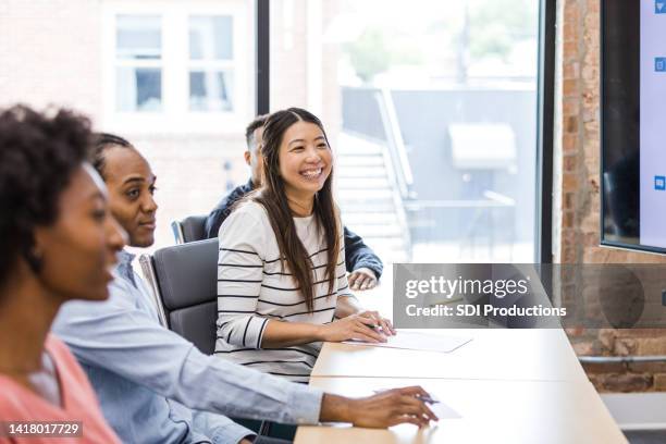new employees attend a welcome event - asian seminar stock pictures, royalty-free photos & images