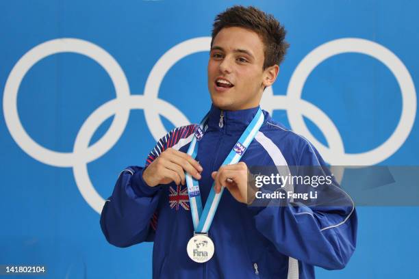 Tom Daley of Great Britain poses with the Silver medal after the Men's 10m Platform Final during day two of the FINA/Midea Diving World Series 2012...