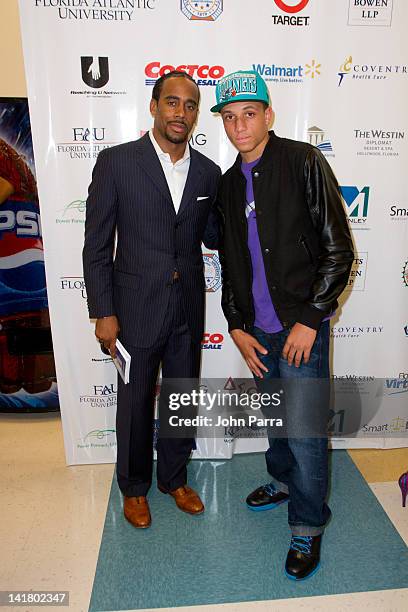 Jeff Johnson and Malcom Hawkins attend South Florida Youth Summit #I AM Change Youth Symposium And college fair at Miami Carol City Senior High...