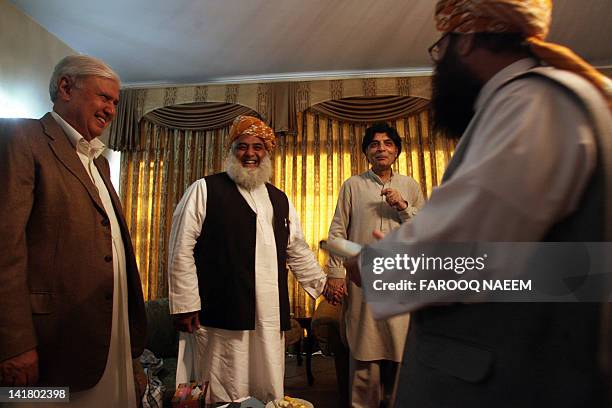 Pakistani opposition leaders Aftab Sherpao , Maulana Fazal-ur-Rehman , Chaudhry Nisar and Mulana Gafur Hadri , arrive at a meeting to discuss the...