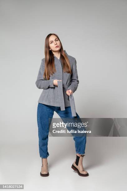 woman in fashionable outfit in studio - woman full body isolated stock pictures, royalty-free photos & images